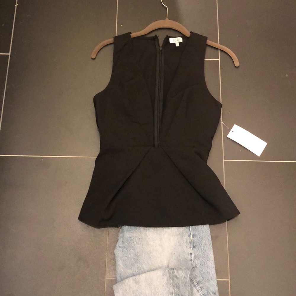 Low cut black peplum blouse